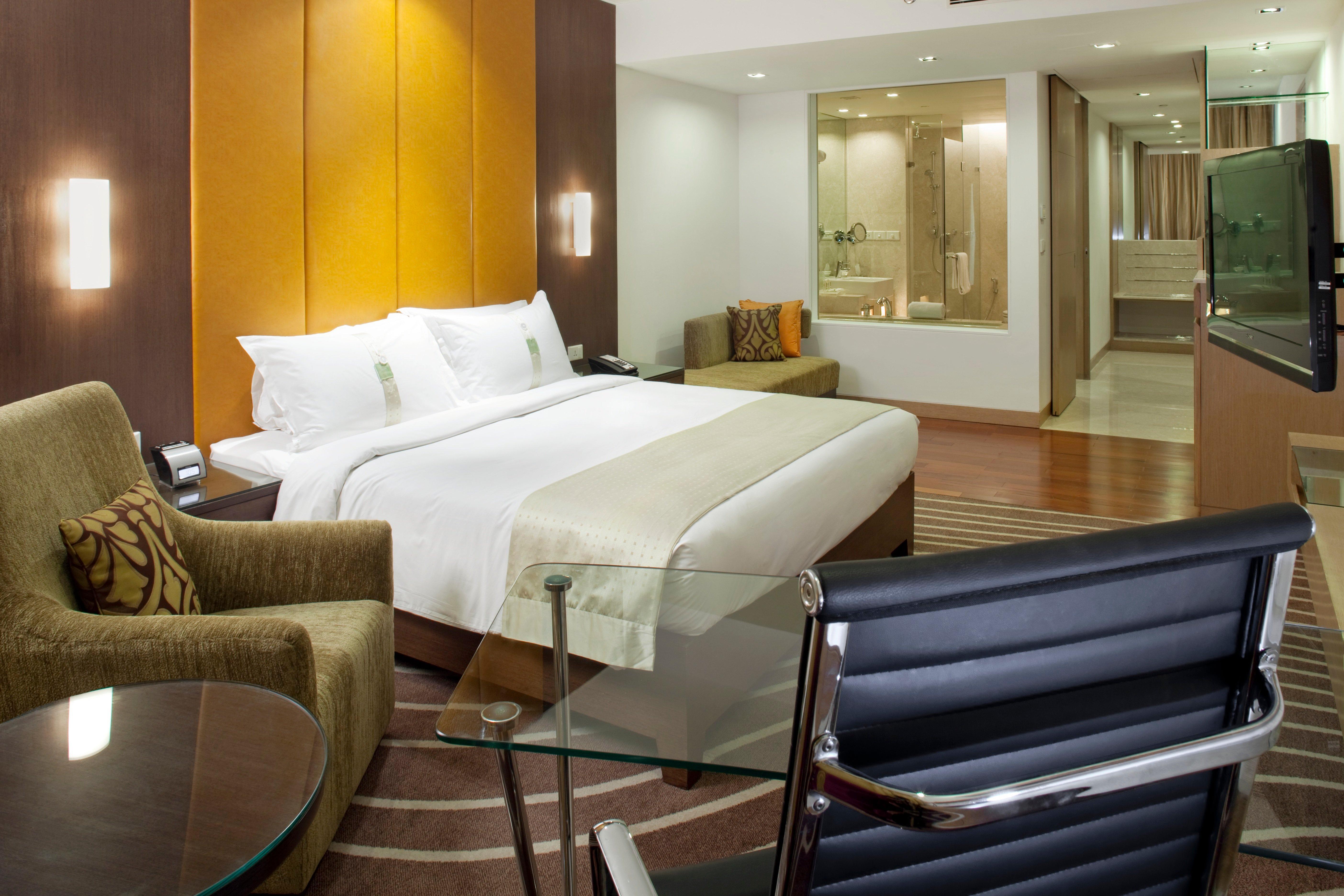 Holiday Inn Mumbai International Airport By Ihg Szoba fotó A suite at the hotel